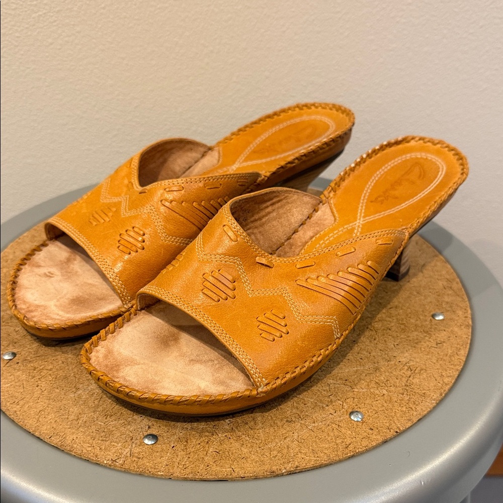 Clarks Women's gold leather mules